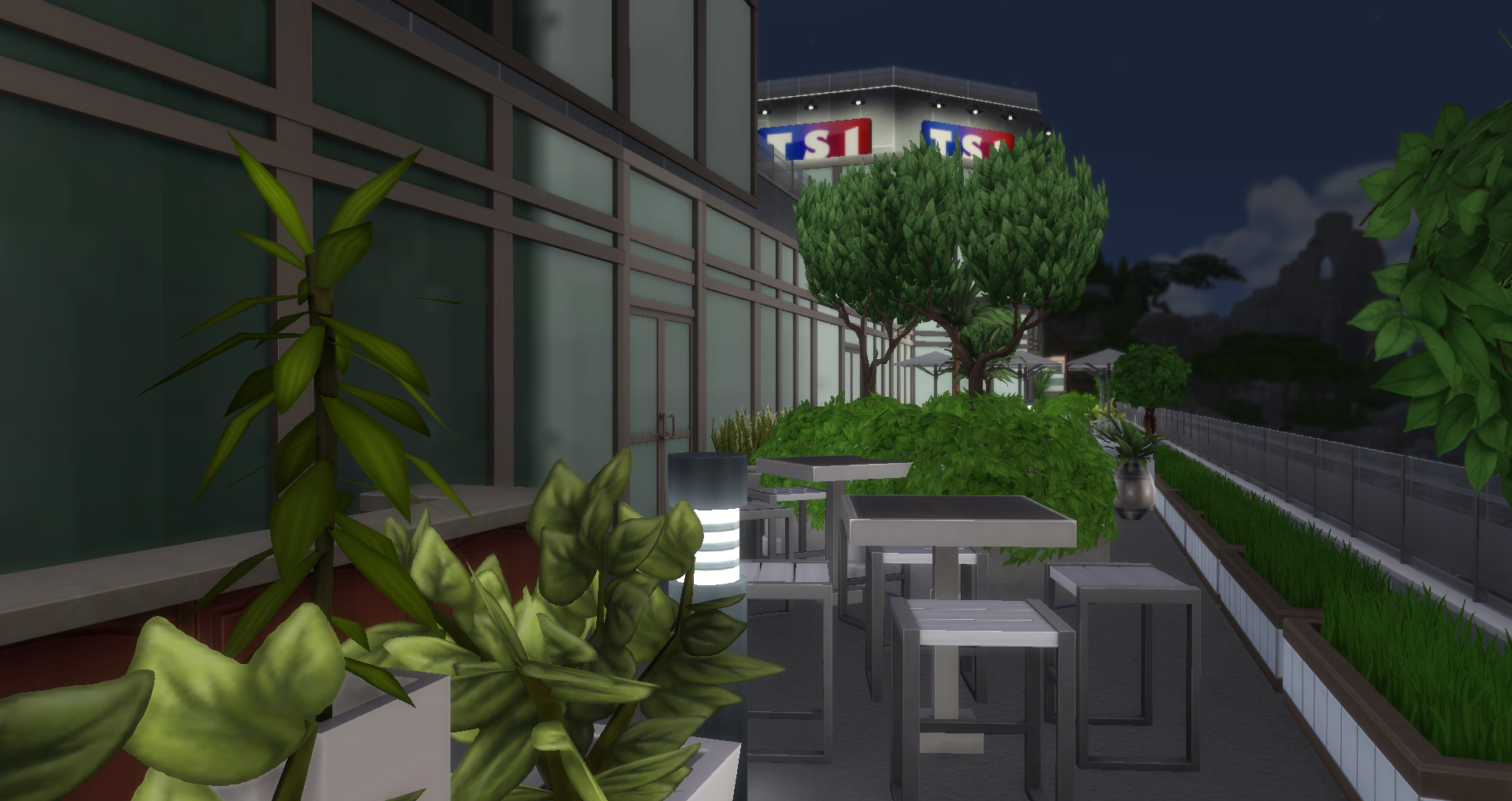 La grande terrasse de nuit avec la vue sur la Tour